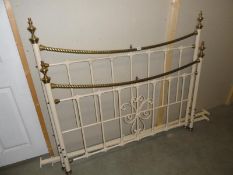 An ornate metal bedstead