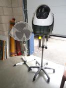 An Elan mobile hood hair dryer and a tall standing fan