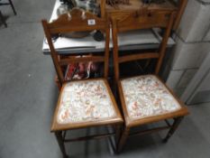 A pair of Edwardian bedroom chairs