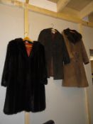 2 suede coats and a fur coat