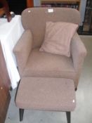 An armchair and stool