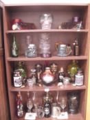 4 shelves of Gothic / macabre drinking vessels and storage bottles / jugs