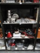 Three shelves of kitchenware