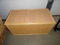 A bamboo and weave ottoman