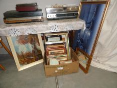 A collection of assorted prints and oil paintings