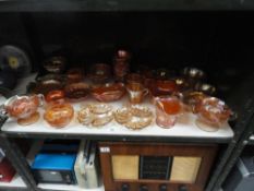 A collection of approximately 26 pieces of assorted Carnival Glass