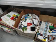 A large collection of matchboxes and covers