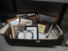 A quantity of small picture frames