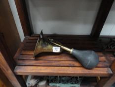 A vintage style brass car horn