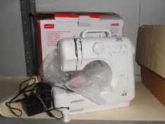 A boxed prolectrix 8 stitch sewing machine