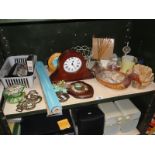 A shelf of miscellaneous including horse brasses & clock etc.