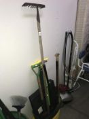 A quantity of garden tools including rake & spade etc.