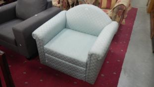 A light blue armchair