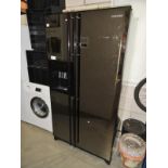 A large Samsung fridge freezer with water & ice dispenser