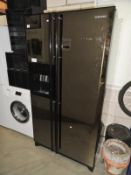 A large Samsung fridge freezer with water & ice dispenser