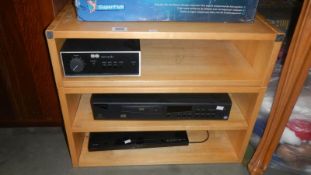 A 3 shelf storage unit with Naim Audio amplifier,