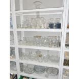 4 shelves of good drinking glasses & cake stands etc.