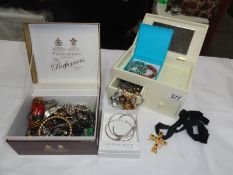 2 boxes of assorted costume jewellery.