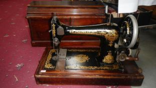 A Singer sewing machine with Egyptian design