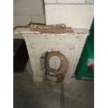 A cast iron fire surround