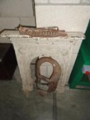 A cast iron fire surround