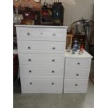 A white set of 6 drawers & a matching set of 3 drawers