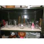 A shelf of assorted glassware including glass bowl etc