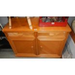 A 2 door 2 drawer sideboard