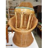 A wicker chair and stool
