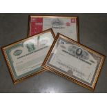 3 framed and glazed share certificates