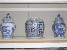 A geometric large Oriental ginger jar & 2 lidded temple jars