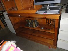 A bookshelf with 3 shelves