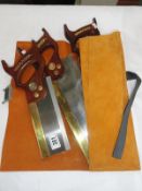 A quantity of Axminster saws and leather pouch.
