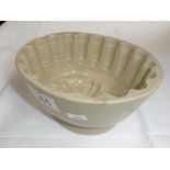 A pottery jelly mould.