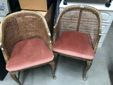 A pair of painted bregere back chairs