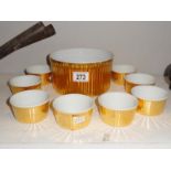 A set of 8 Royal Worcester ramekins & serving bowl