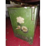 An old metal safe with key, J. Mather & Co, iron mongers & Co, Newark-On-Trent.