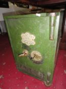 An old metal safe with key, J. Mather & Co, iron mongers & Co, Newark-On-Trent.