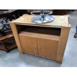 A glass topped TV cabinet