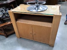 A glass topped TV cabinet