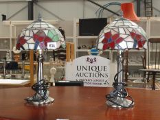 A pair of stain glass lamps