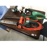 A Black & Decker hedge trimmer & 1 other