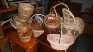 A large quantity of wicker baskets including beehive nesting box