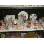 A shelf of assorted figures including animals