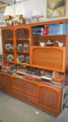 A teak effect wall unit