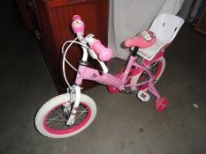 A child's Hello Kitty bike