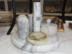 A marble condiment set