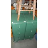 A green painted 6 drawer chest