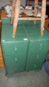 A green painted 6 drawer chest