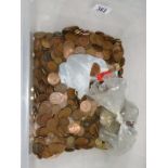 A large quantity of coins, mostly British copper.